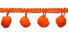 Bolletjes band oranje per meter